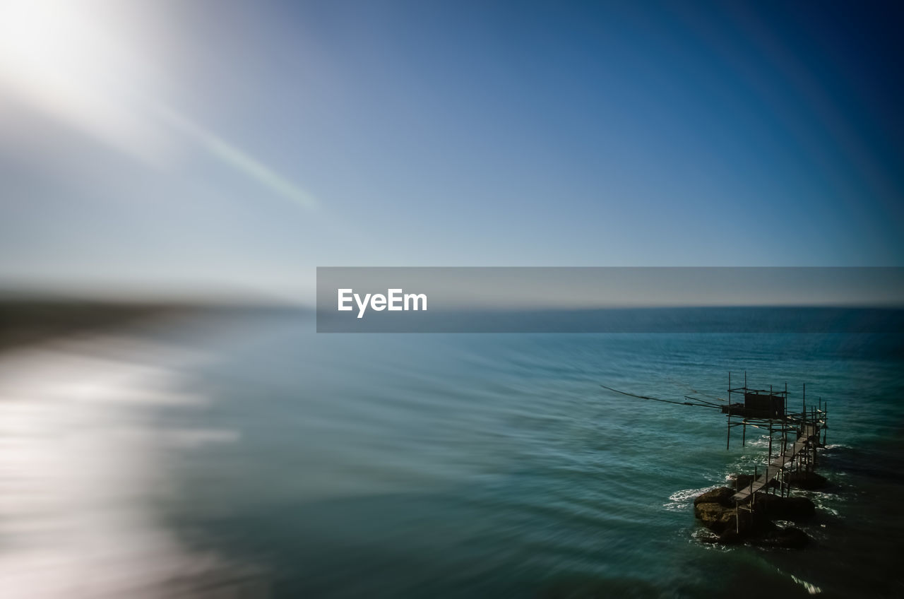 SCENIC VIEW OF SEASCAPE AGAINST SKY