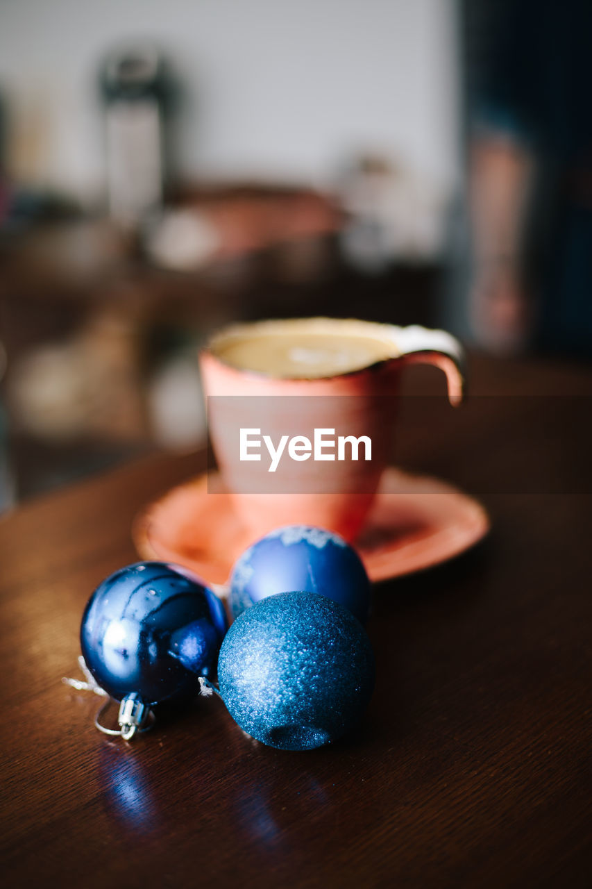 Close-up of coffee cup on table