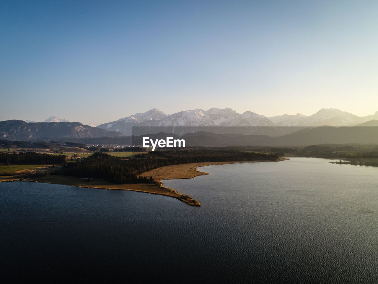 Scenic view of lake against clear sky