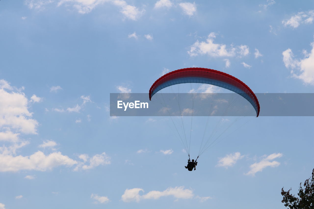 Paraglider high in the sky