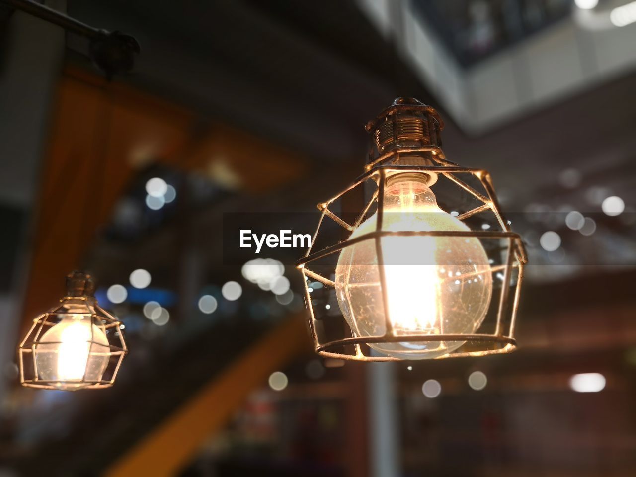 Low angle view of illuminated light bulb