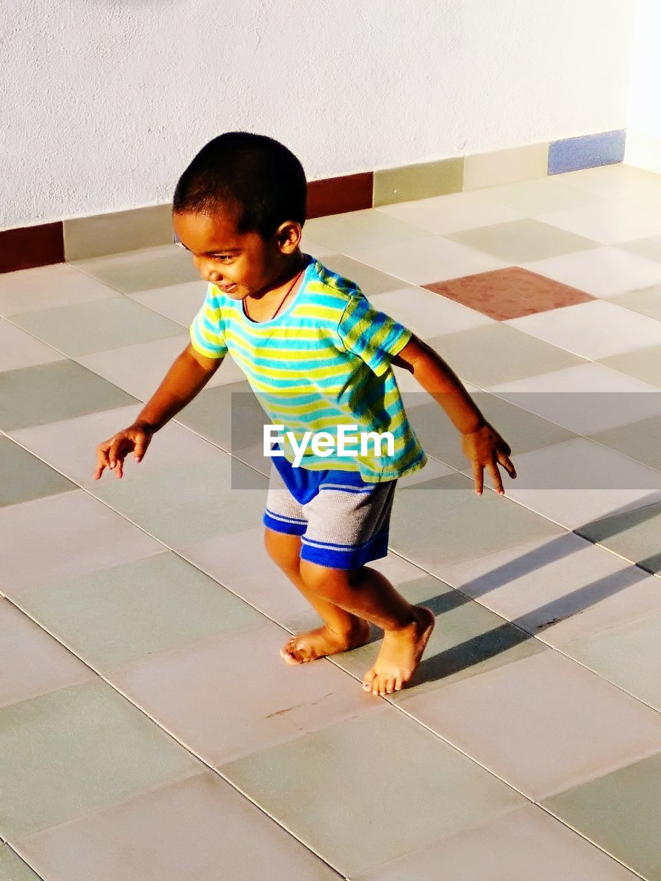 Playful boy at home