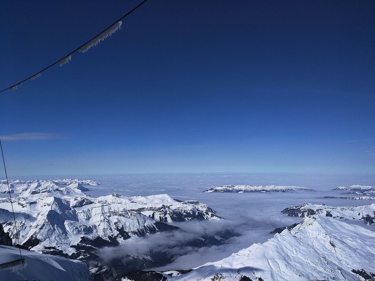 Scenic view of frozen sea against clear sky