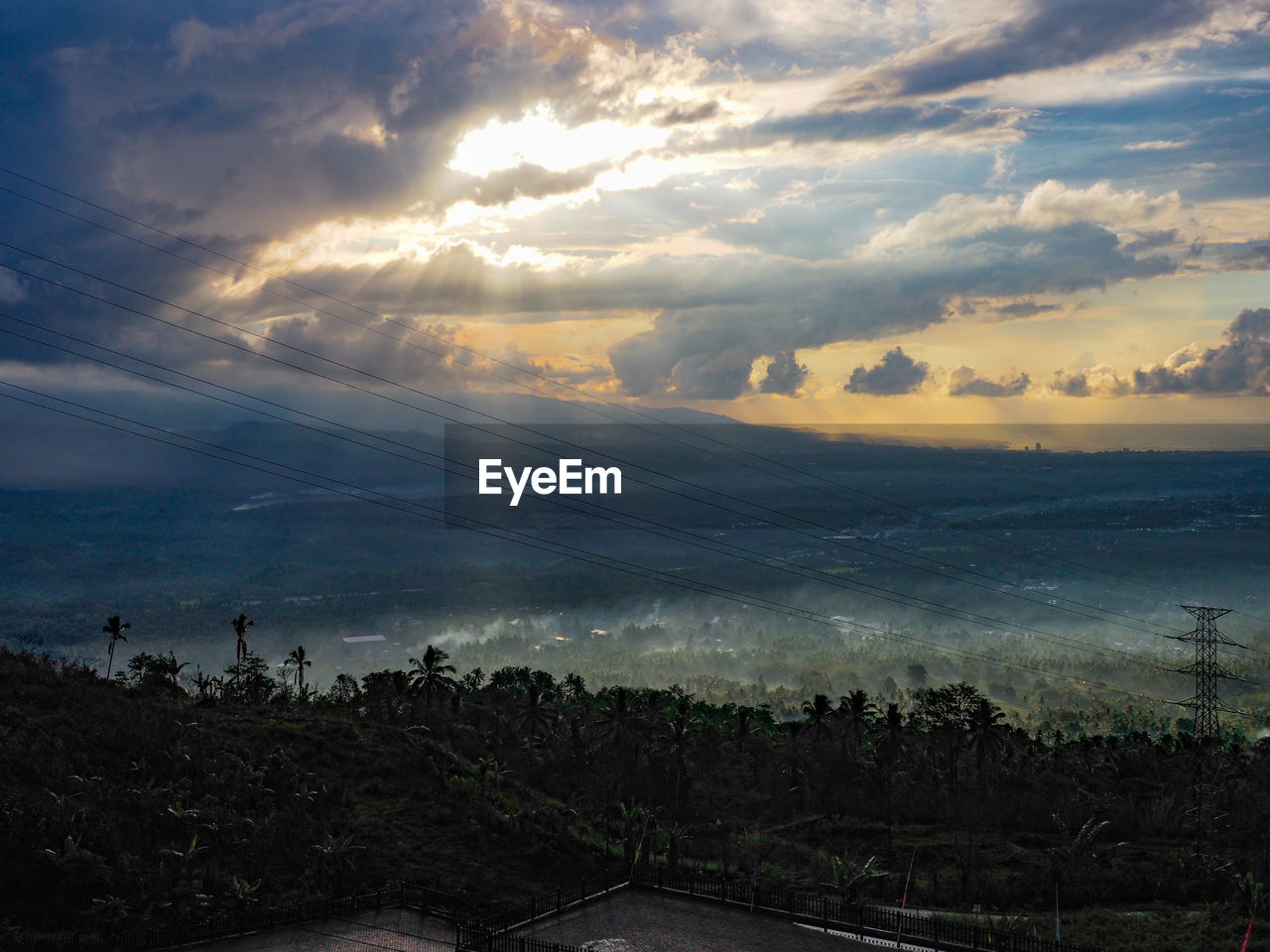 Scenic view of landscape against sky during sunset