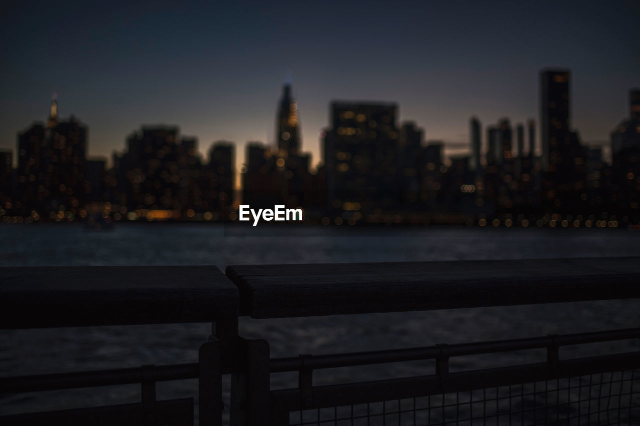 View of city buildings at dusk