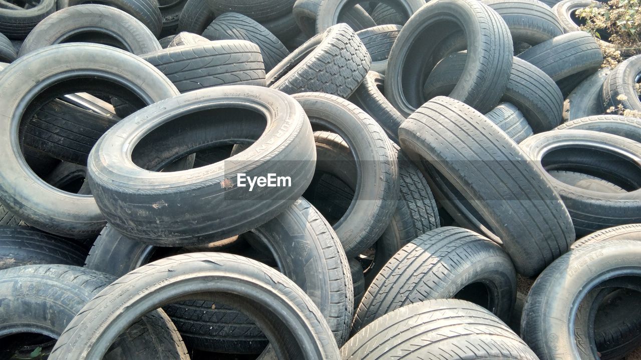 Full frame shot of tires on field