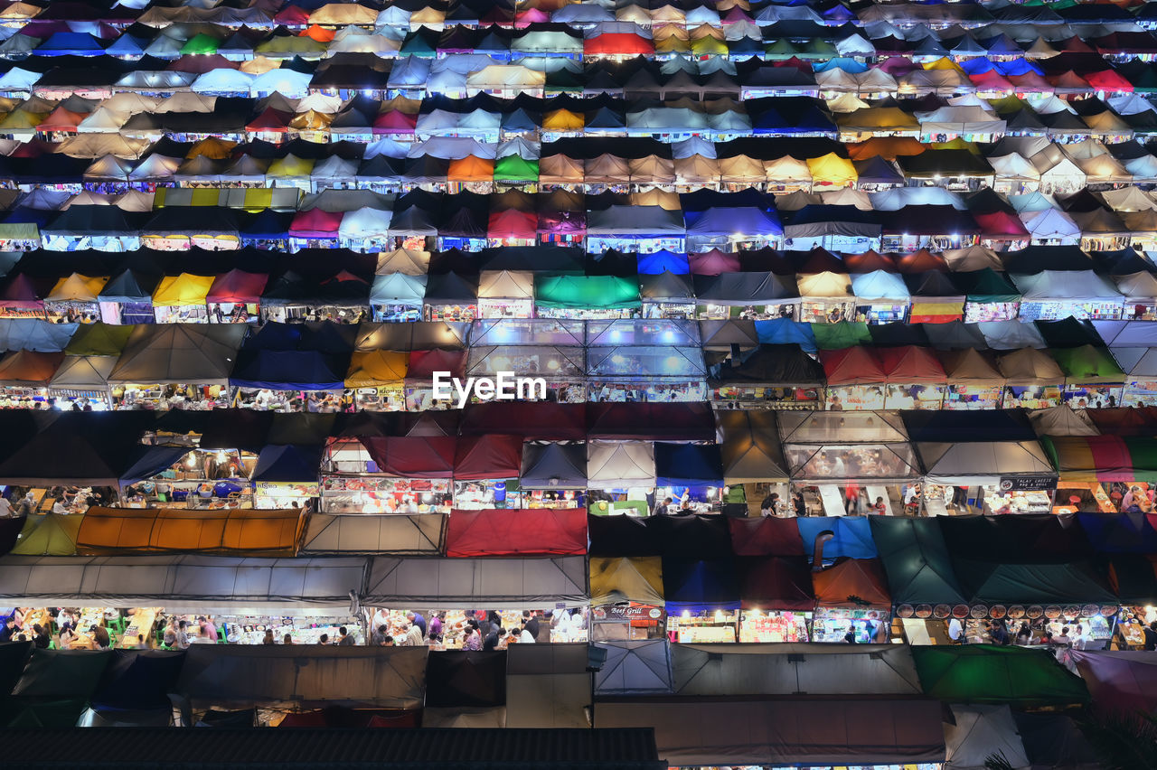 High angle view of illuminated buildings at night