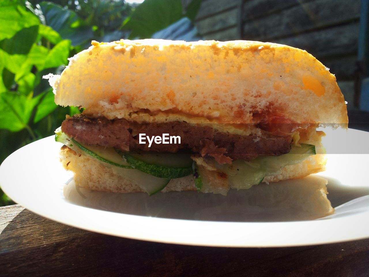 Close-up of fresh homemade burger served in plate