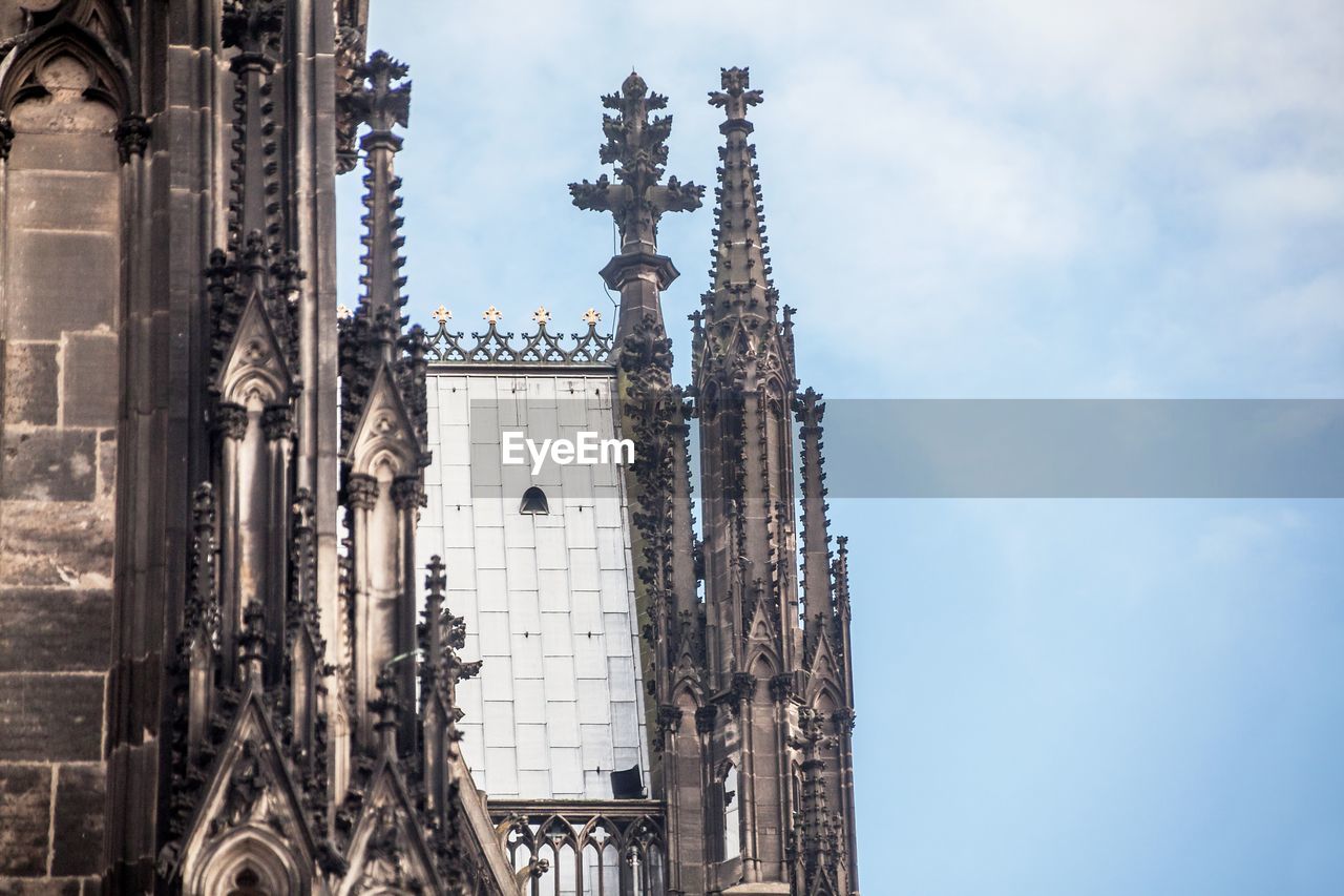 Low angle view of cologne cathedral against sky