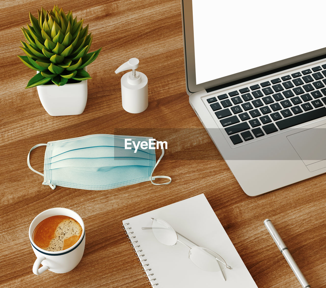 HIGH ANGLE VIEW OF COFFEE CUP AND LAPTOP ON TABLE