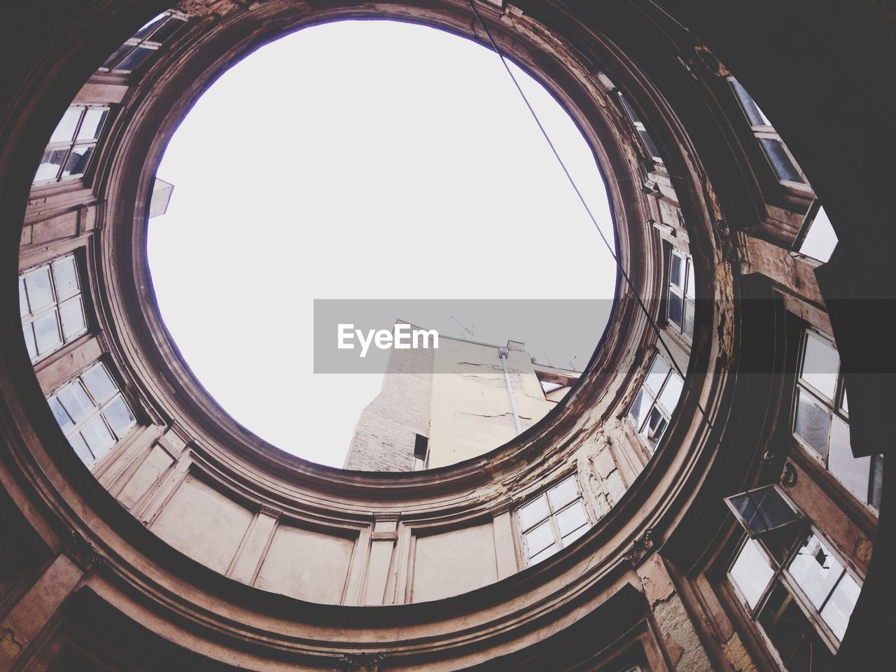 Low angle view of skylight in old building