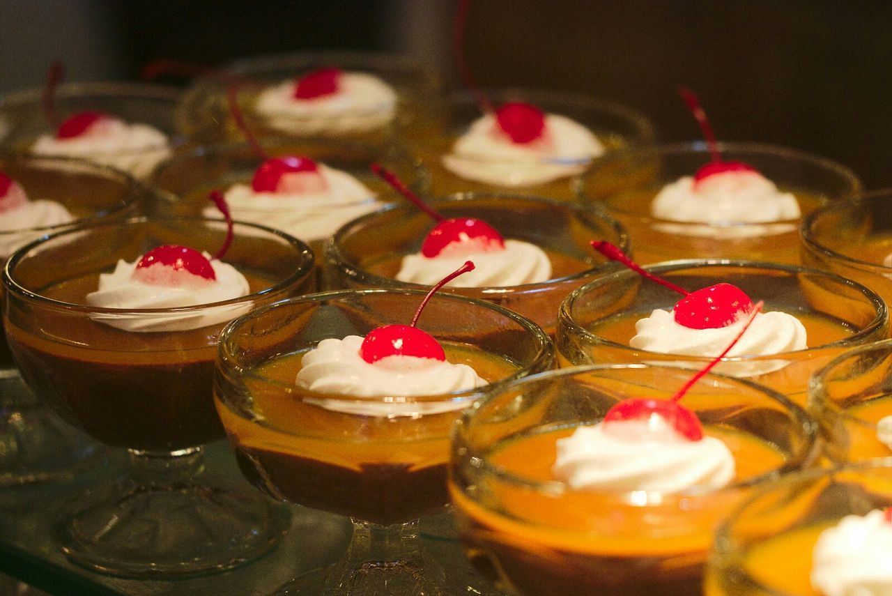 Dessert cups with cherry on top