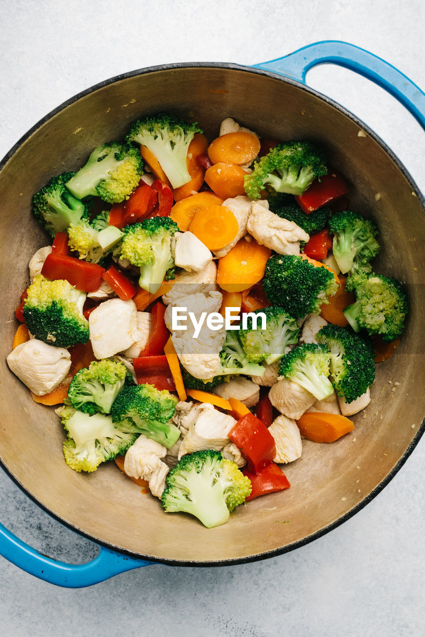 Chicken cubes and mixed veggies in a dutch oven