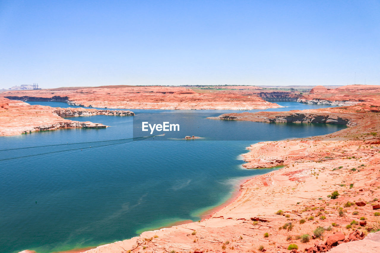 Scenic view of sea against clear sky