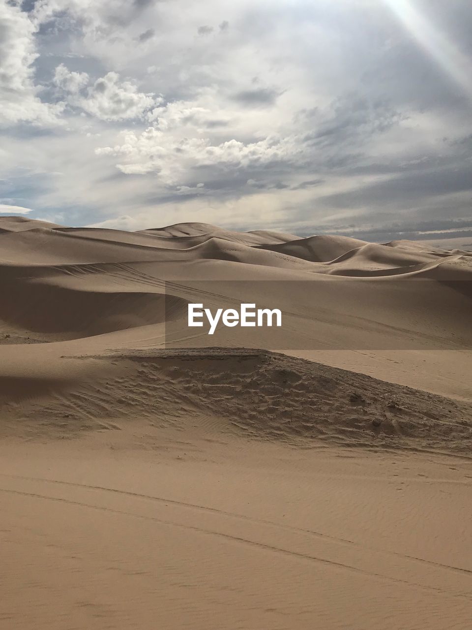 Scenic view of desert against sky