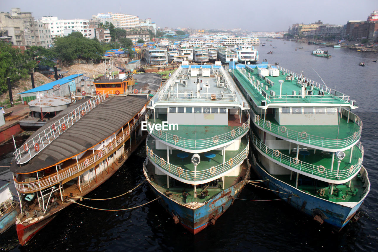 High angle view of river amidst buildings in city