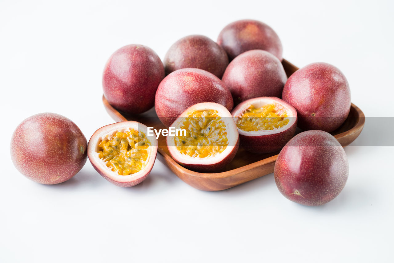Close-up of fruits against white background
