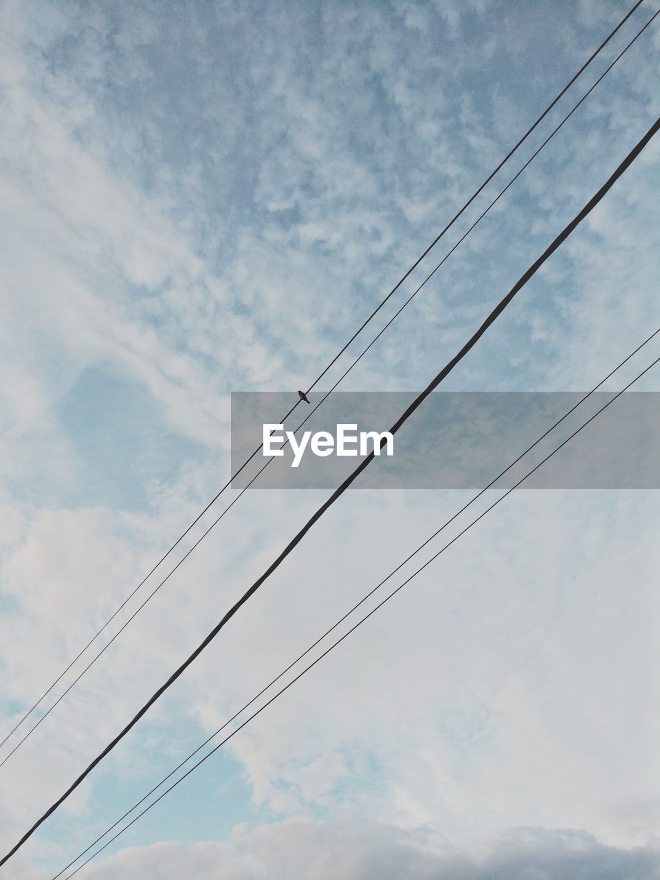 LOW ANGLE VIEW OF ELECTRICITY PYLON AGAINST SKY