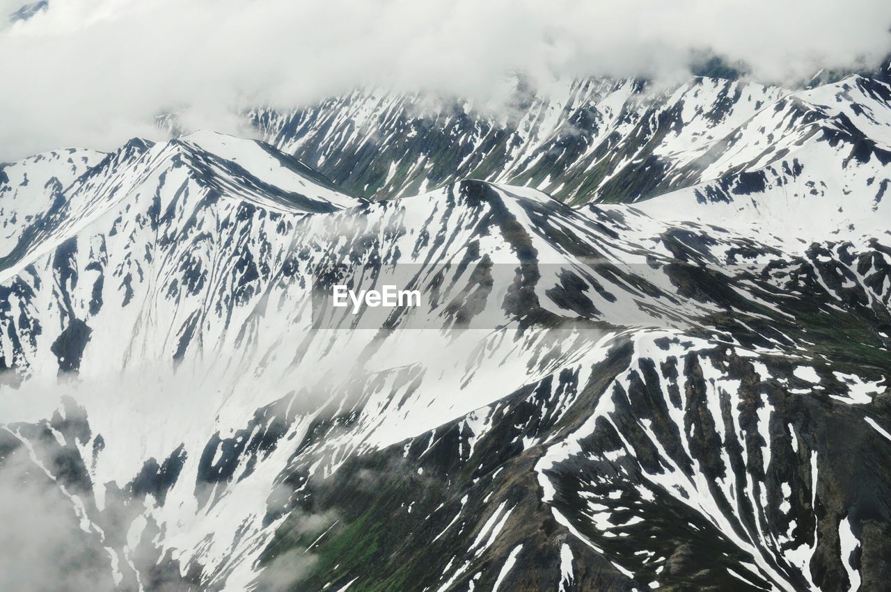 Scenic view of snow covered mountains