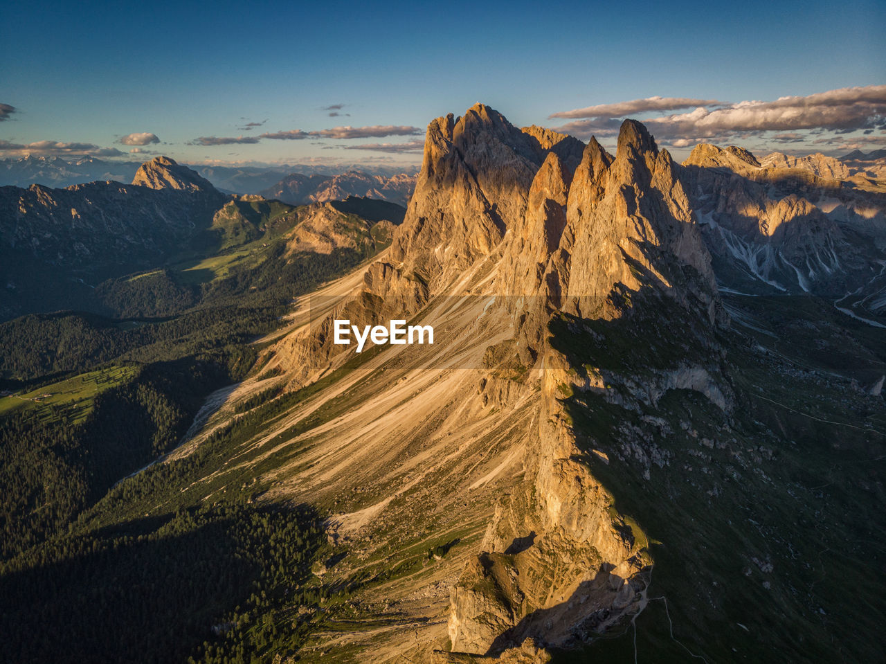 Last sunrays at the geisler peaks - scenic view of dramatic landscape against sky