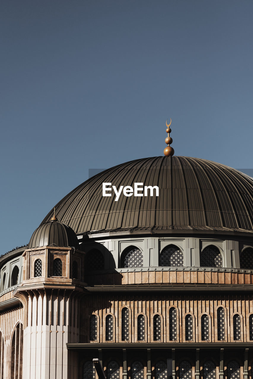 Low angle view of building against clear sky