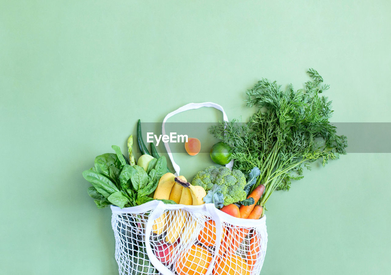 FRESH GREEN VEGETABLES IN BASKET