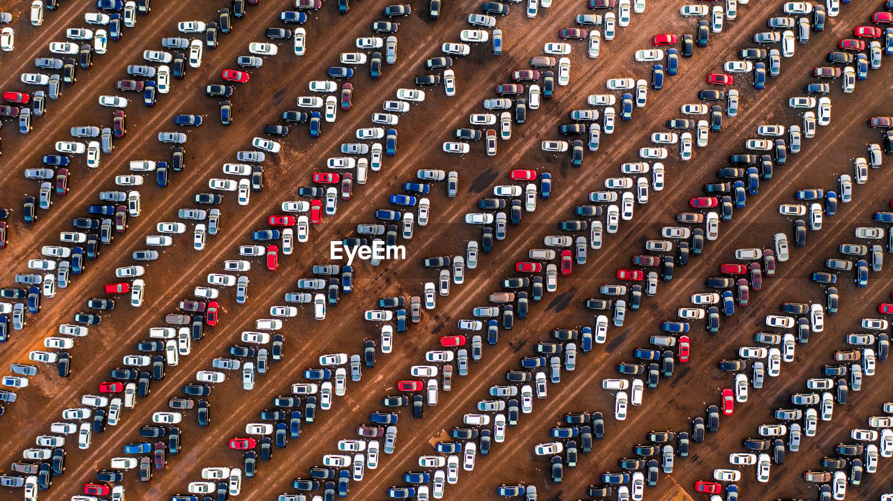 Aerial view of cars parked in parking lot