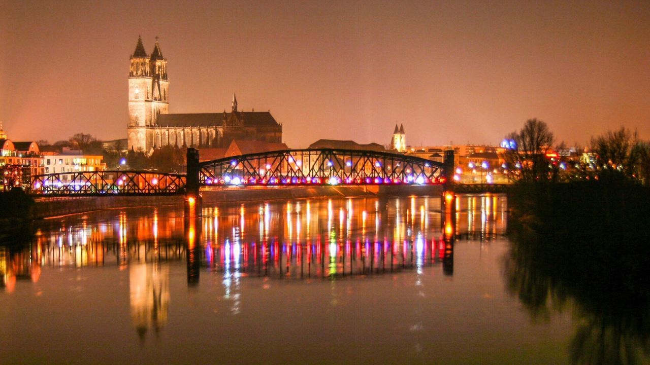 ILLUMINATED BUILDINGS AT NIGHT