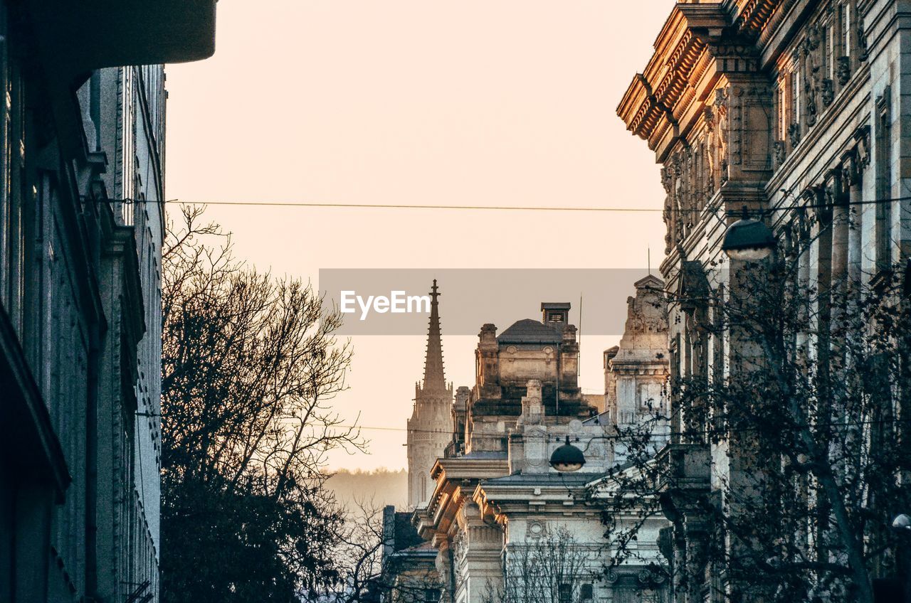 Low angle view of buildings against clear sky