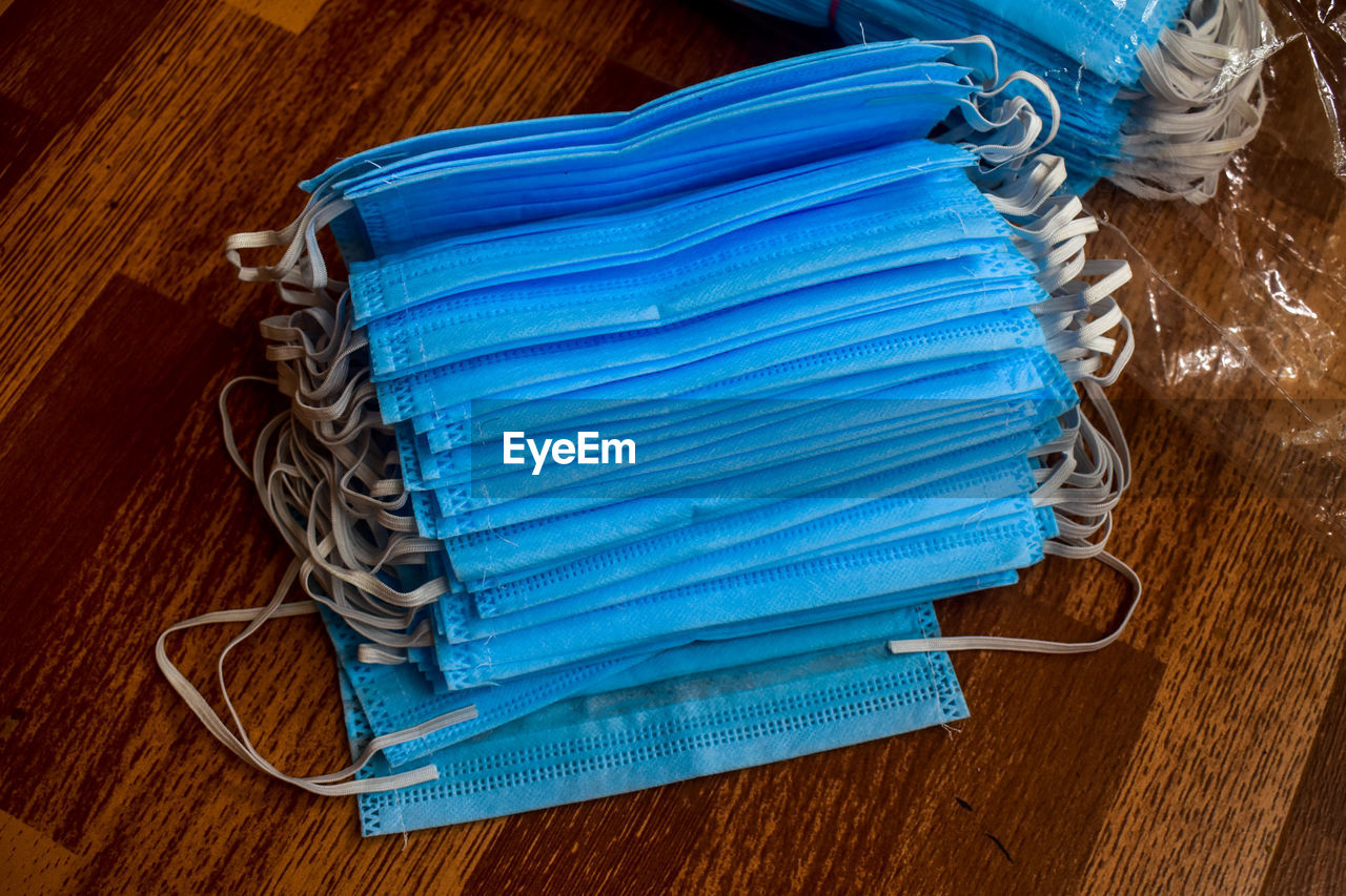 High angle view of face masks on table