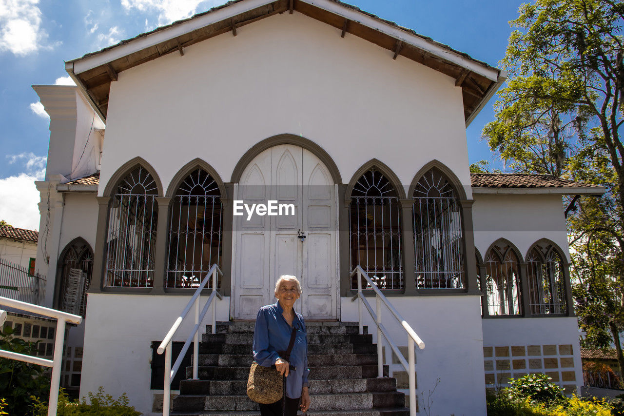 Senior woman tourist at the historical cemetery of the beautiful heritage town of salamina