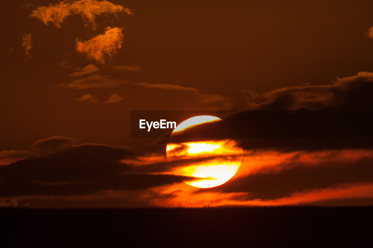 LOW ANGLE VIEW OF ORANGE SKY