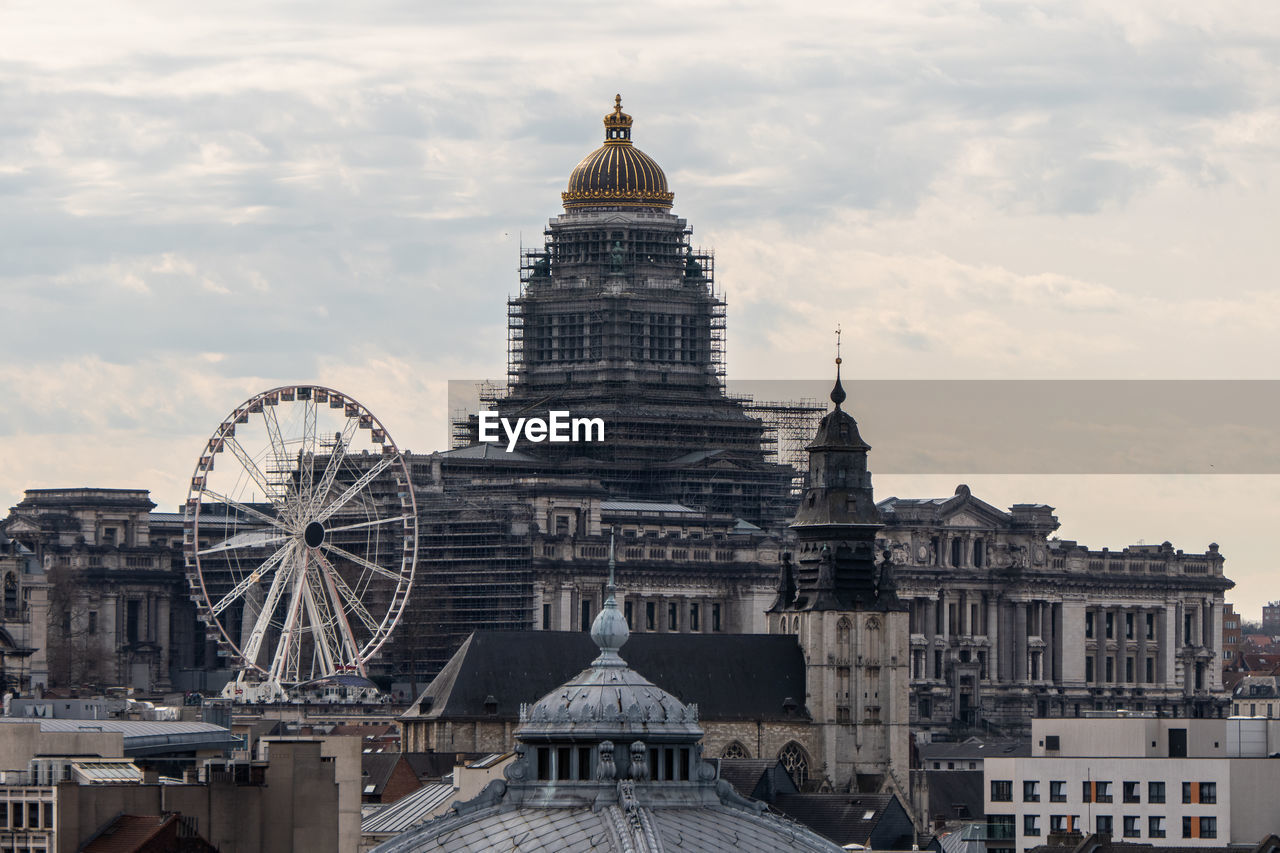 Brussels, belgium, march 17, 2023. courthouse and ferris wheel 