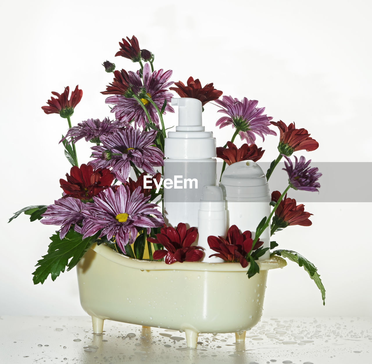 flower, plant, flowering plant, nature, freshness, indoors, beauty in nature, pink, no people, floristry, studio shot, arrangement, vase, food and drink, still life, flower arrangement, floral design, food, flower head, container, petal, table, flowerpot, white background, fragility, decoration, purple, bouquet, white, bunch of flowers