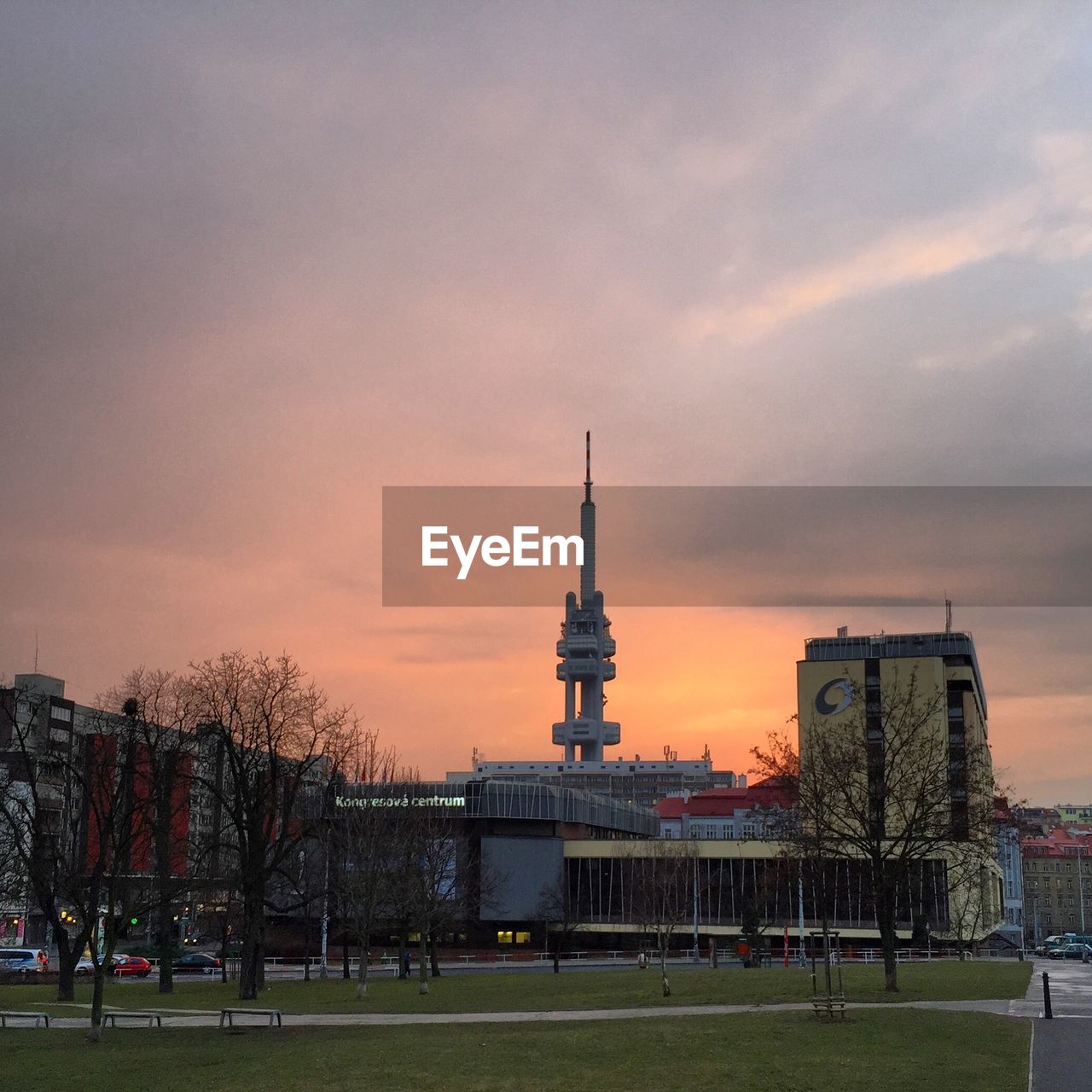 BUILDING AGAINST SKY DURING SUNSET