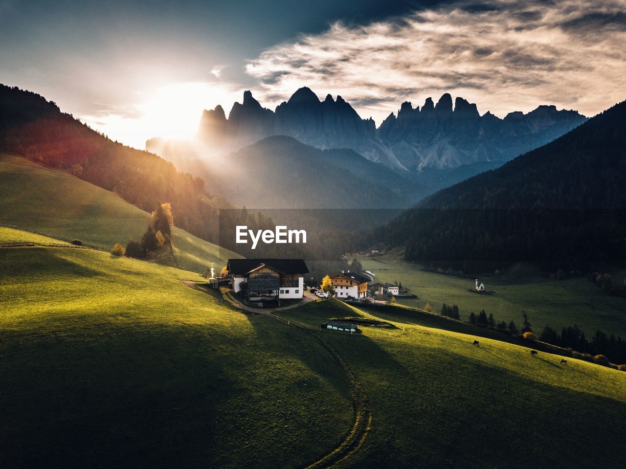 Scenic view of landscape against sky during sunset