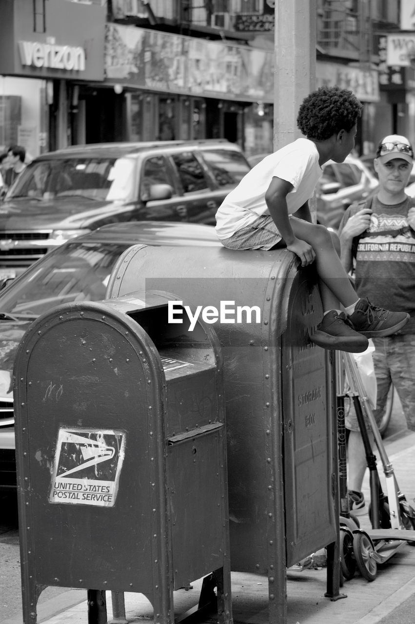 REAR VIEW OF PEOPLE IN BUS