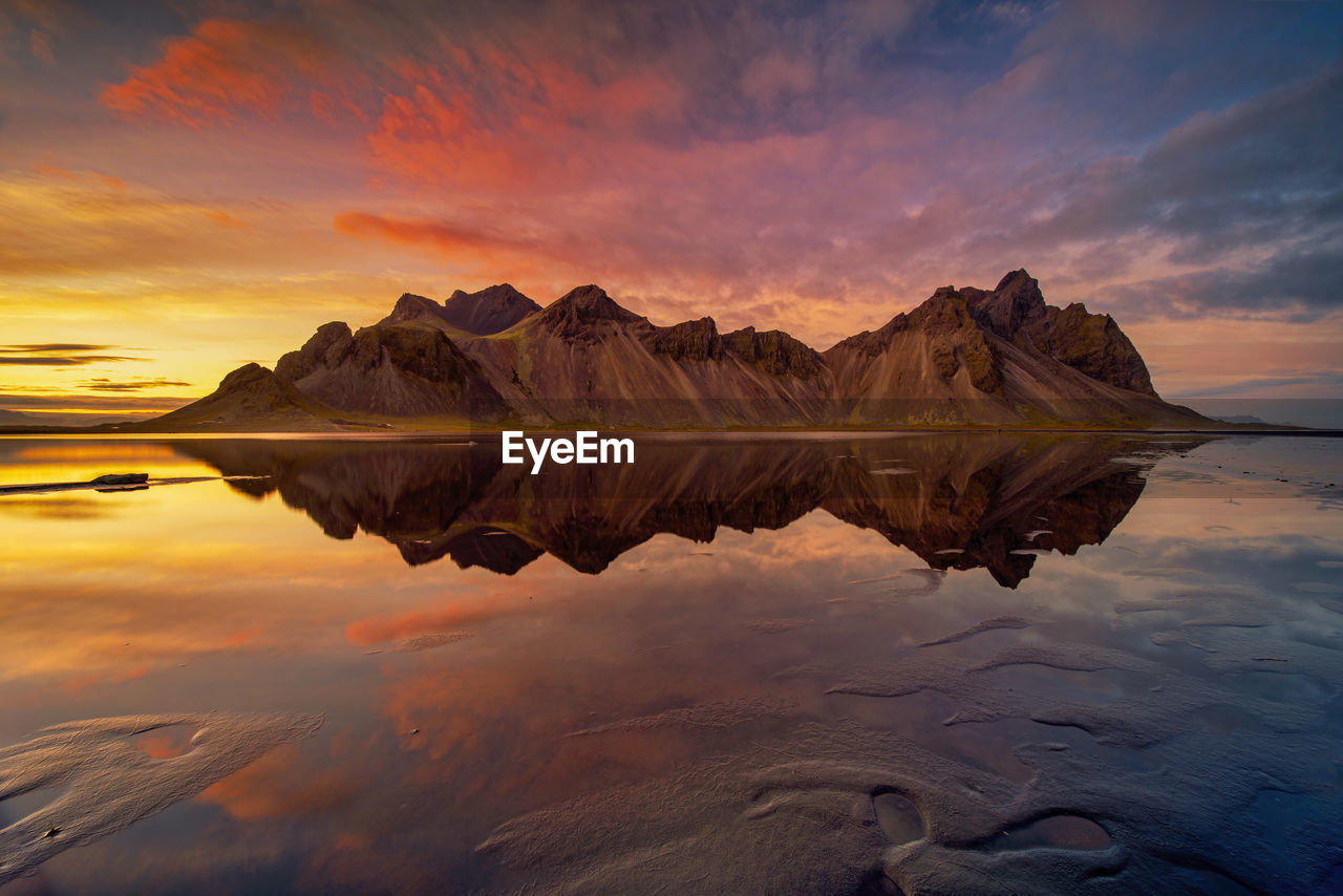 Dramatic evening sunset sky at vestrahorn mountain in stokksnes, iceland