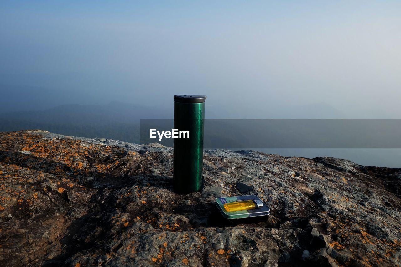 SCENIC VIEW OF ROCKS AGAINST SKY