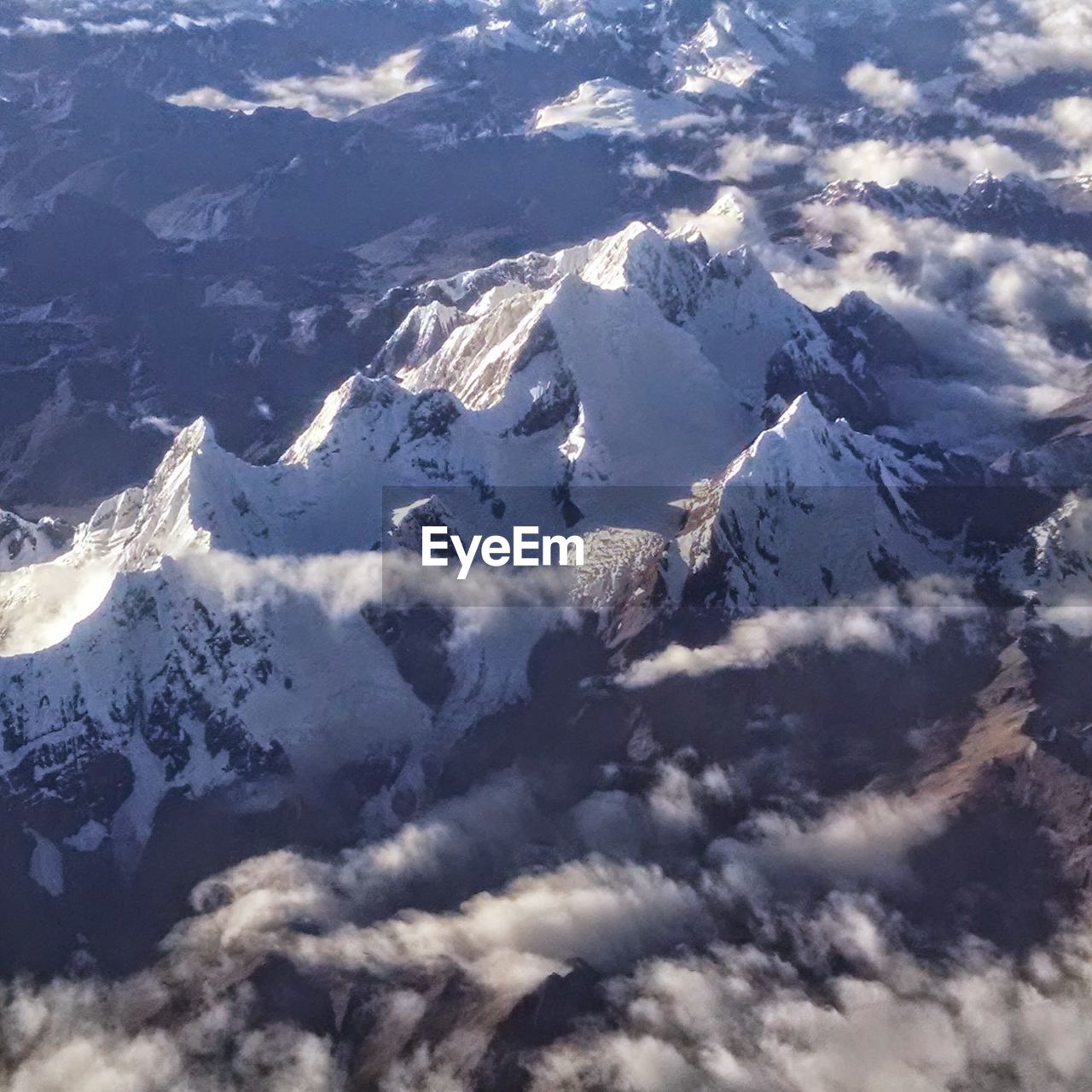 SCENIC VIEW OF SNOWCAPPED MOUNTAIN AGAINST SKY