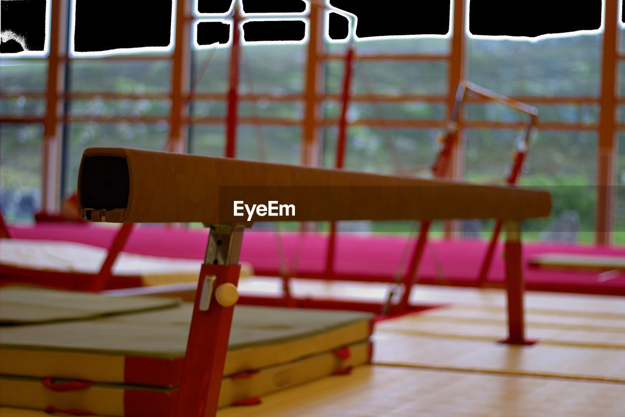 Close-up of balance beam in gym