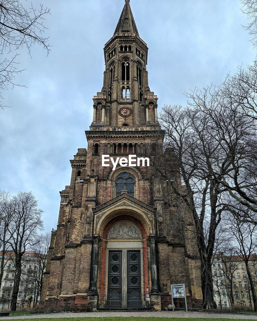 LOW ANGLE VIEW OF CLOCK TOWER