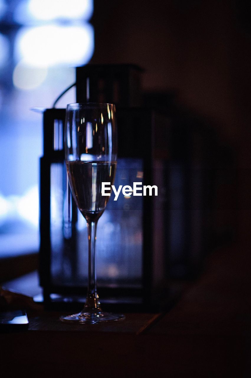 Close-up of wineglass on table