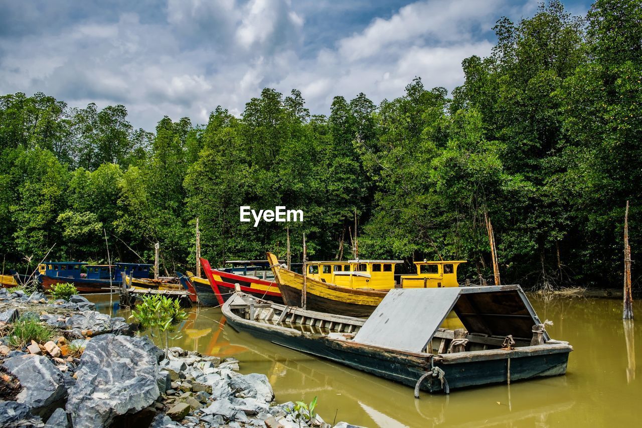 Fisherman place with boats at the river