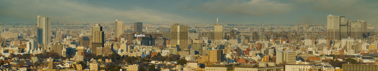 Panoramic shot of buildings against sky