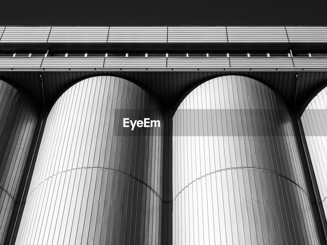 Low angle view of silos