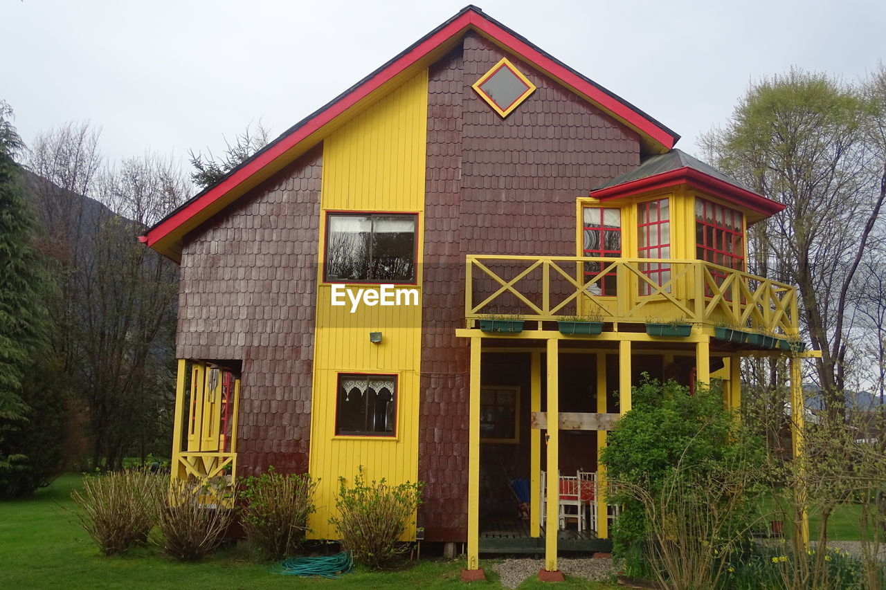 EXTERIOR OF HOUSES AGAINST CLEAR SKY