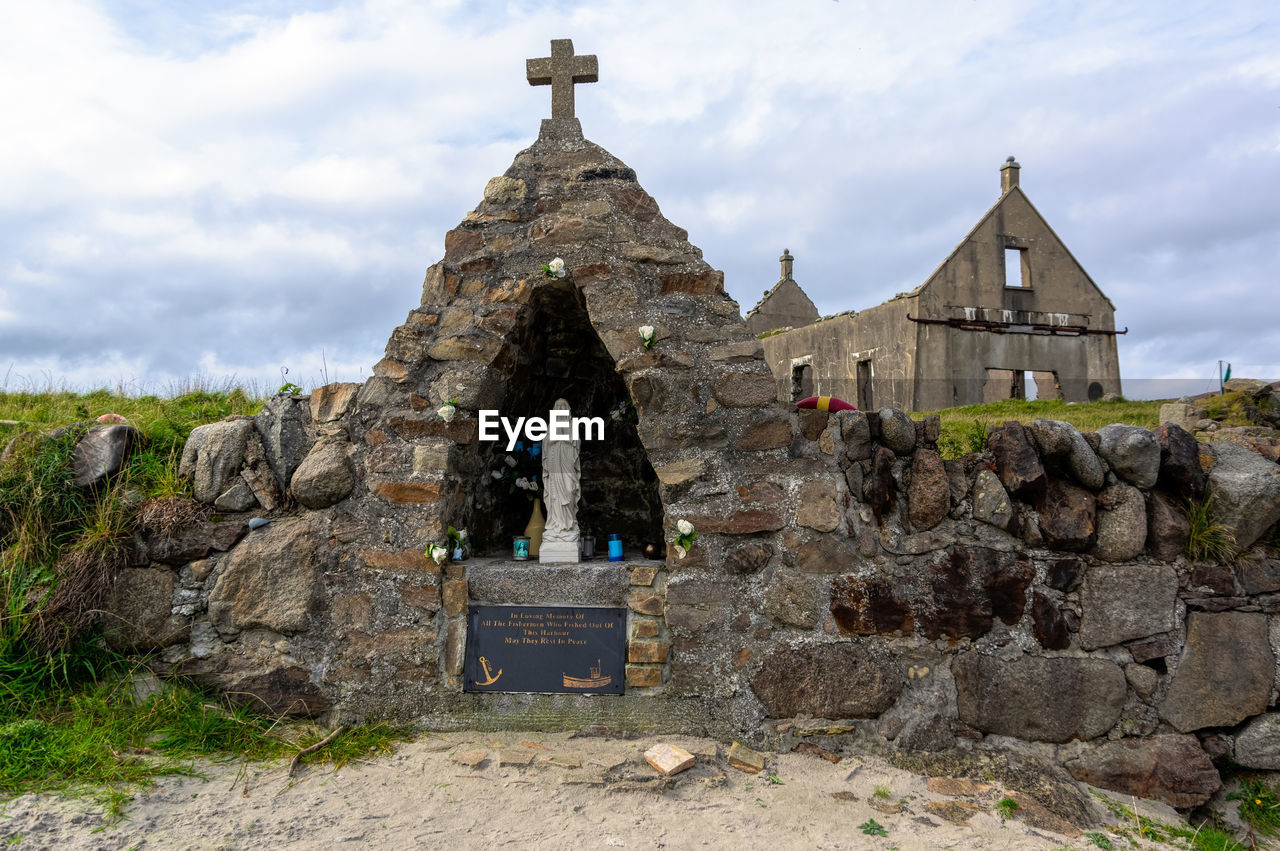 HISTORIC BUILDING AGAINST ROCK