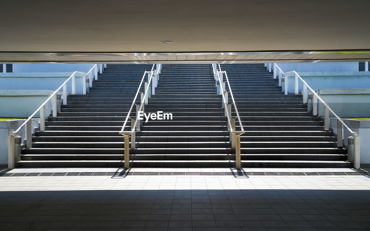 Empty staircase of building in city