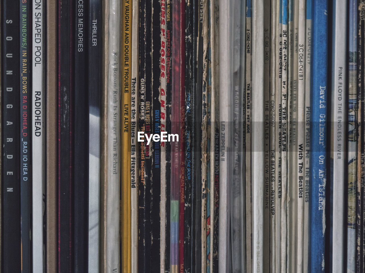 Close-up of vinyl records on a shelf